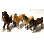 Three Beswick horse figures: A Palomino, a Highland pony and a brown pony;  a Beswick style Shire