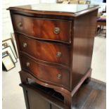 A reproduction mahogany 3 height chest of drawers with serpentine front