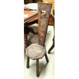 An early 20th century carved wood spinning chair; a Regency period mahogany carver chair, (repaired)