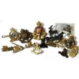 A collection of military officers badges, silvered and gilded etc.