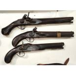 Three replica pistols:  a percussion cap and 2 flintlocks