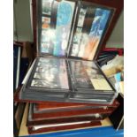 GB: a collection of approx. 150 sets of mint stamps in packets in 4 albums