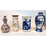 A selection of Chinese blue and white brush pot, Chinese vase and other similar Chinese items.