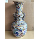 A large early - mid 20th Japanese satsuma vase of baluster form with long flared neck, decorated