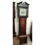 An early 19th century crossbanded oak longcase clock with broken arch pediments, turned reeded