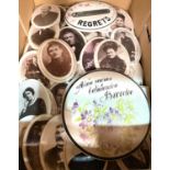 A collection of photographs on ceramic plaques