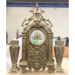 An early 20th century Victorian style brass clock garniture with French 8 day movement.