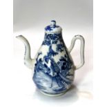 A Chinese blue and white tea pot with thin spout and handle, traditional decoration, height 19cm (