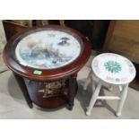 A circular mahogany occasional table with Lord Nelson scene to top under glass 'England Expects