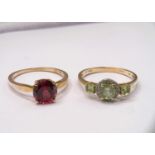A 9ct ring set with colour change garnet and white zircon, size P/Q; a 9ct ring set with round