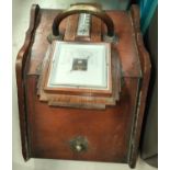 An Edwardian walnut slope front coal box; a wall handing hall brush rack (barometer)