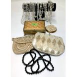 Two 1950's beadwork evening bags; crystal necklaces; a mother-of-pearl compact; a musical