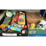 A selection of vintage children's toys including tin plate globes, wooden toys etc.