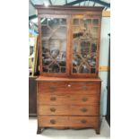 A George III period mahogany scretaire bookcase with moulded cornice and twin astragal glazed