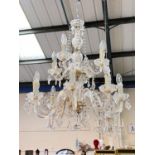 A Victorian style 12 branch 2 tier glass chandelier with cut and faceted drops