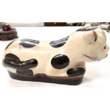 A Chinese ceramic neck rest in the form of a cat length 27cm