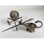 A table lighter in the form of Aladdin's lamp, Birmingham 1912, 3oz; a white metal croquet trophy in