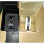 An Armani ladies datejust wristwatch AR0122 boxed with leather strap; a Nina Ricci Ladies wristwatch