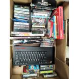 A vintage Sinclair ZX Spectrum + computer and a good selection of various games etc