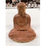 A Japanese stoneware depiction of Buddha seated in lotus position height 18cm