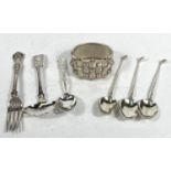 A pierced sifter spoon; 4 small hallmarked silver teaspoons and a flask, various dates, 4oz; a white
