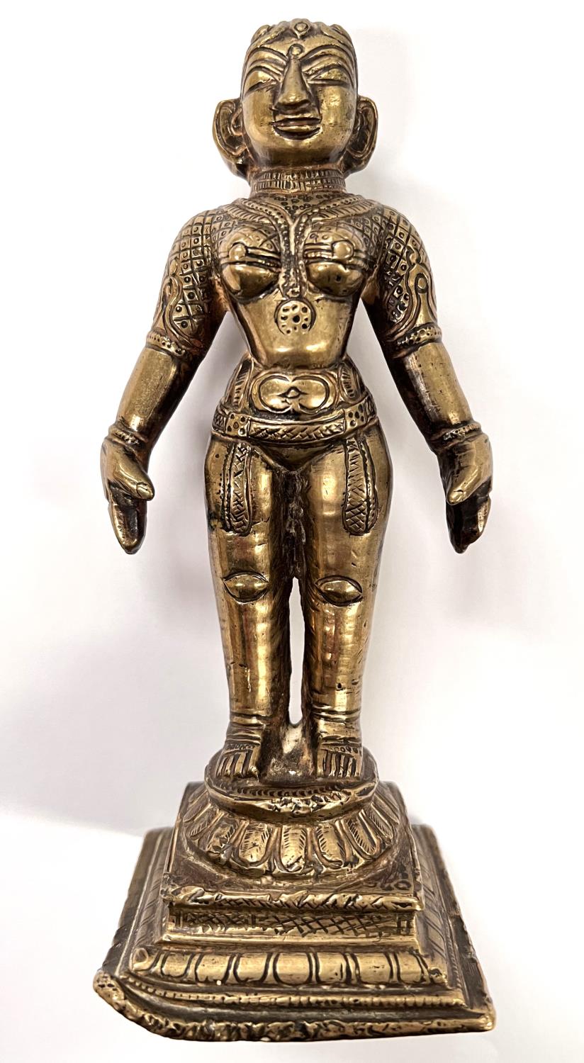 A bronze Hindu statue of female with incised decoration height 16cm