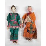 2 Chinese opera dolls in traditional clothes, painted faces with associated box height 25.5cm