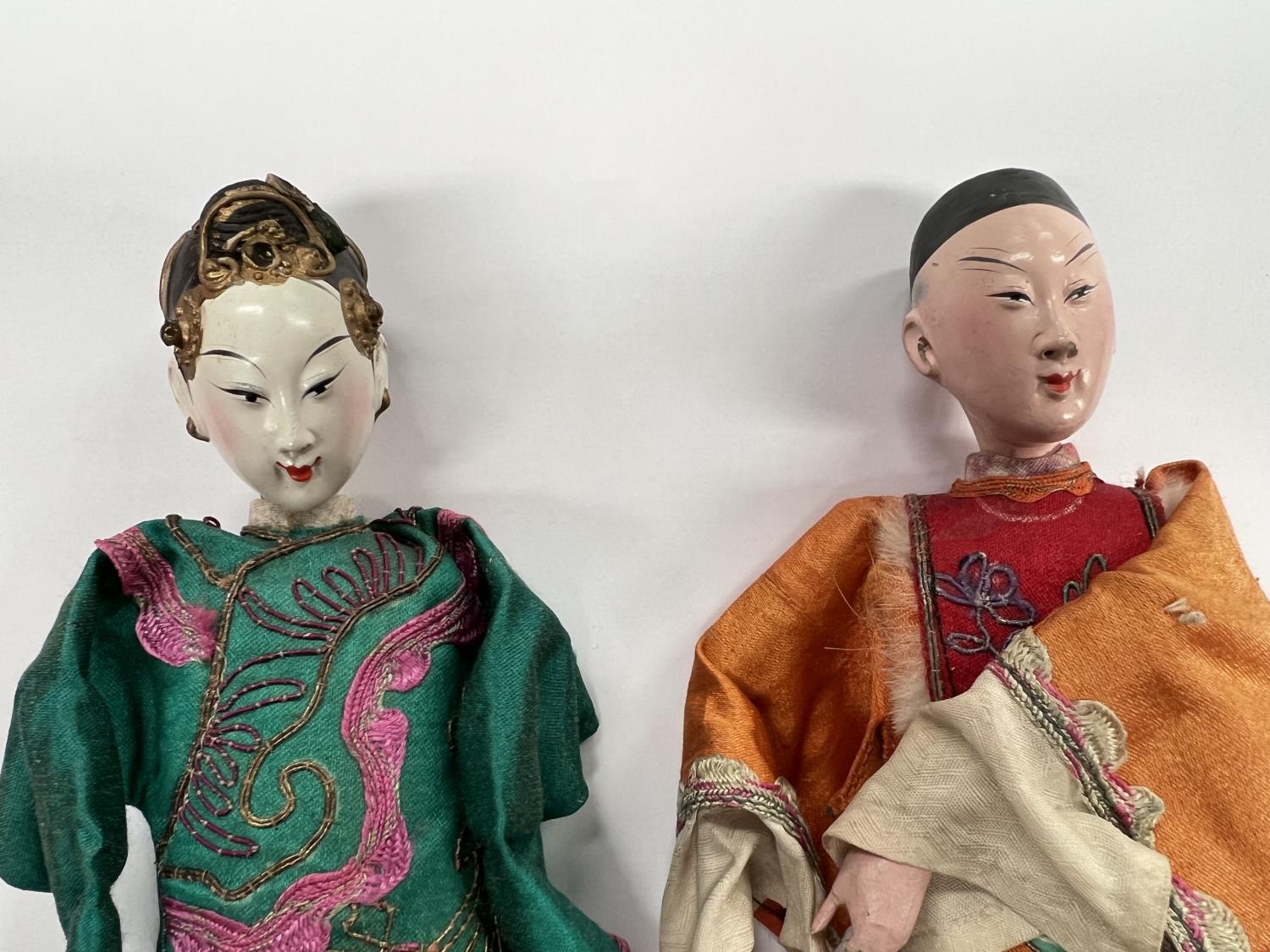 2 Chinese opera dolls in traditional clothes, painted faces with associated box height 25.5cm - Image 2 of 3