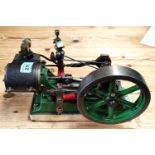 A scratch built stationery engine with governing fly wheel