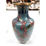 A 19th century Chinese cloisonne vase with blue ground floral decoration height 22.5cm