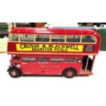 A Sun Star 1:24 scale double decker red London bus with advertising panels for Crosse & Blackwell