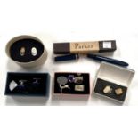 A vintage blue Parker fountain pen, in box; a selection of decorative cufflinks including one silver