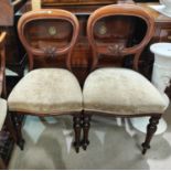 A Victorian set of 6 mahogany dining chairs with balloon backs, overstuffed seats in brown, on