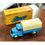 An originally boxed Dinky:- 413 blue and cream Austin Covered Waggon.