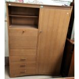 A 1960's lightwood combination wardrobe