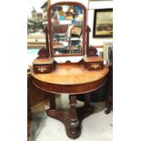 A Victorian mahogany demi-lune dressing table with 2 jewellery drawers and under tier, on turned