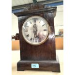 An RAF 'Officers Mess'  oak cased clock made by W. Elliott Ltd. No.3873 with circular silvered