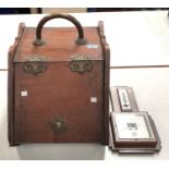 An Edwardian walnut slope front coal box; a wall hanging hall brush rack (barometer)