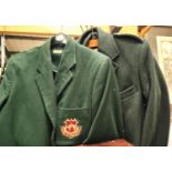 A Blackpool Transport Corporation jacket with buttons and badges and two similar jackets
