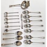 A hallmarked silver sifter spoon; 10 hallmarked silver teaspoons with chased decoration; 6