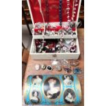 A selection of costume jewellery, brooches, cameos, necklaces etc