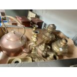 A copper kettle; a selection of brassware