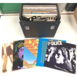 A selection of 40 1980's LP's and 12 inch singles in record case