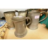 Three large pewter tankards; 4 similar smaller