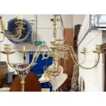 A period style brass 6 branch brass centre light; A period style brass 8 branch brass centre light;A