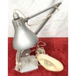 A vintage angle poise lamp; a telephone