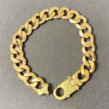A gent's 9 carat gold flat link bracelet, 21cm, 44.2gm