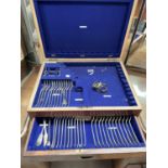 A boxed part canteen of silver plated cutlery in fitted oak box