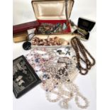 A selection of costume jewellery, mainly necklaces, pendants etc.
