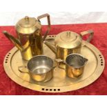 An Austrian secessionist brass 5 piece tea service with square relief + period decoration bearing an